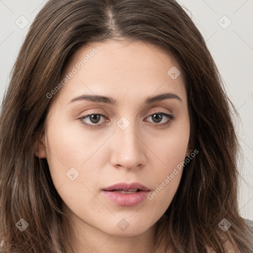 Neutral white young-adult female with long  brown hair and brown eyes