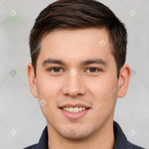 Joyful white young-adult male with short  brown hair and brown eyes