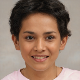 Joyful white child female with short  brown hair and brown eyes