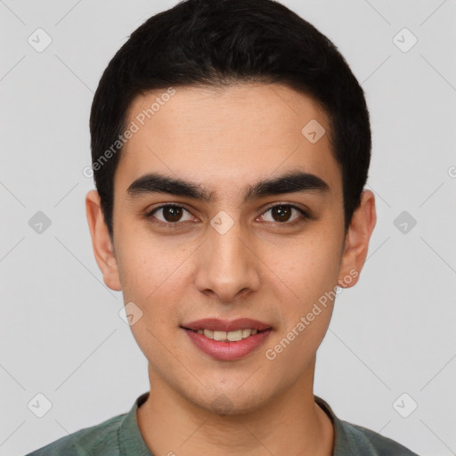 Joyful latino young-adult male with short  black hair and brown eyes