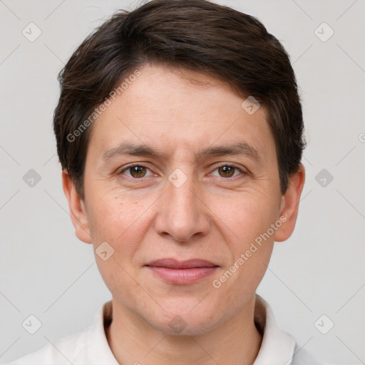 Joyful white adult male with short  brown hair and brown eyes