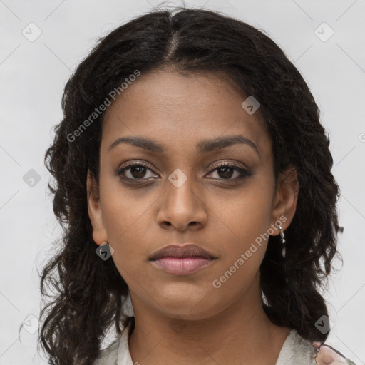 Neutral black young-adult female with long  brown hair and brown eyes