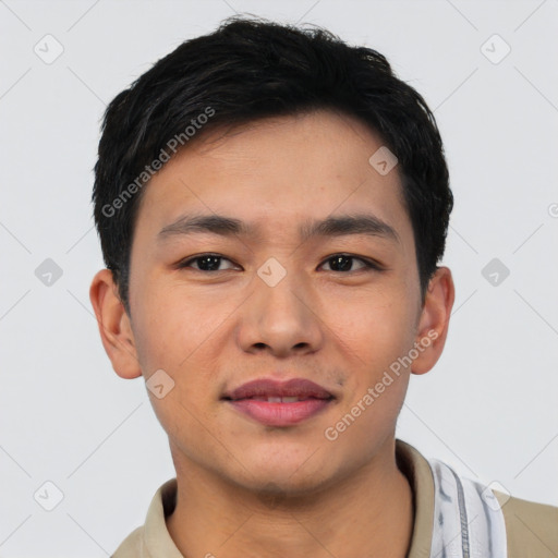 Joyful asian young-adult male with short  black hair and brown eyes