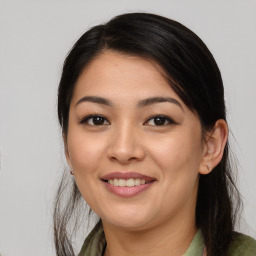 Joyful asian young-adult female with medium  brown hair and brown eyes