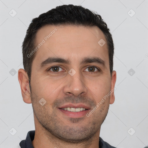 Joyful white young-adult male with short  brown hair and brown eyes