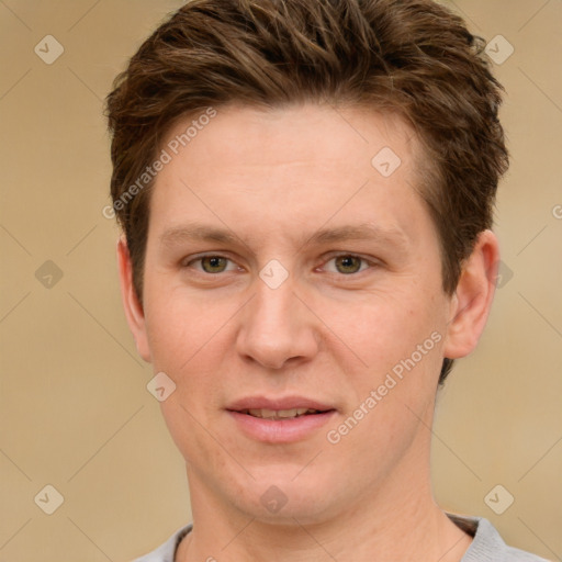 Joyful white adult male with short  brown hair and grey eyes