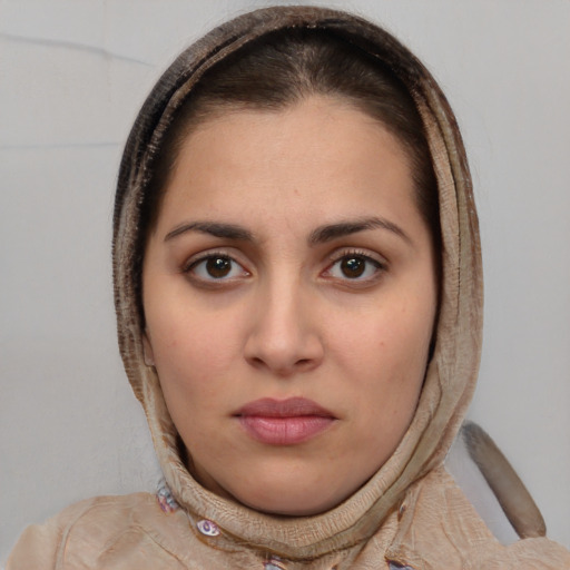 Neutral white young-adult female with short  brown hair and brown eyes