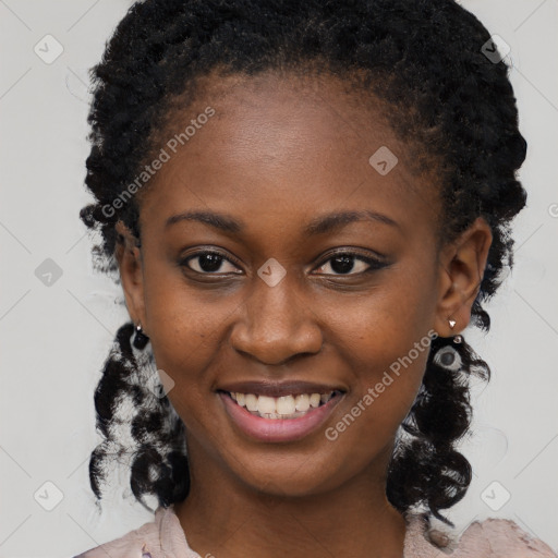 Joyful black young-adult female with medium  black hair and brown eyes