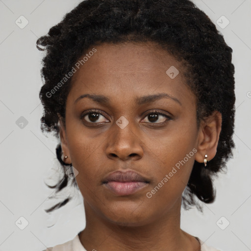 Neutral black young-adult female with short  brown hair and brown eyes