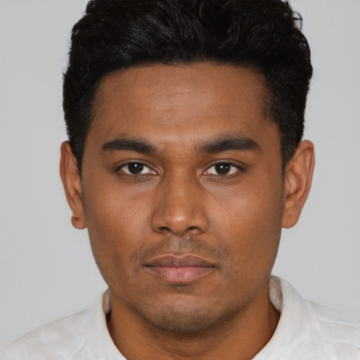 Neutral latino young-adult male with short  black hair and brown eyes