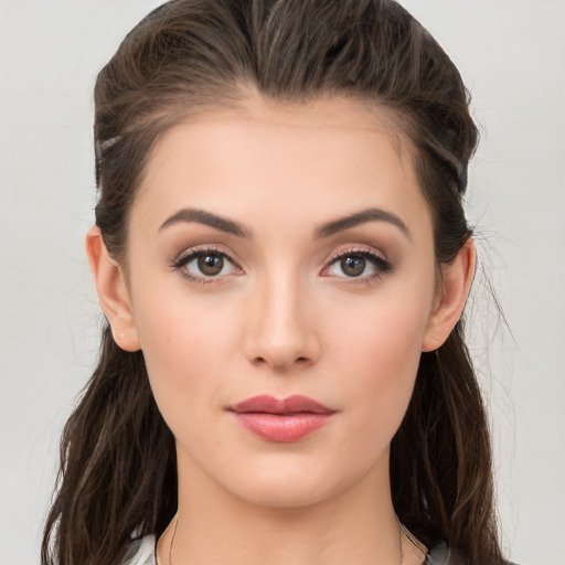 Neutral white young-adult female with medium  brown hair and brown eyes