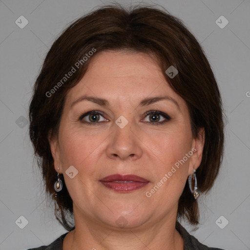 Joyful white adult female with medium  brown hair and brown eyes