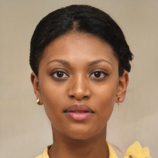 Neutral black young-adult female with short  black hair and brown eyes