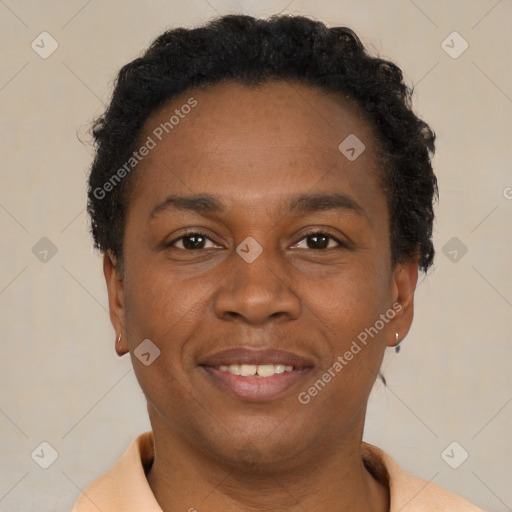 Joyful latino young-adult male with short  brown hair and brown eyes