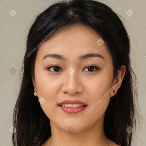 Joyful latino young-adult female with long  brown hair and brown eyes