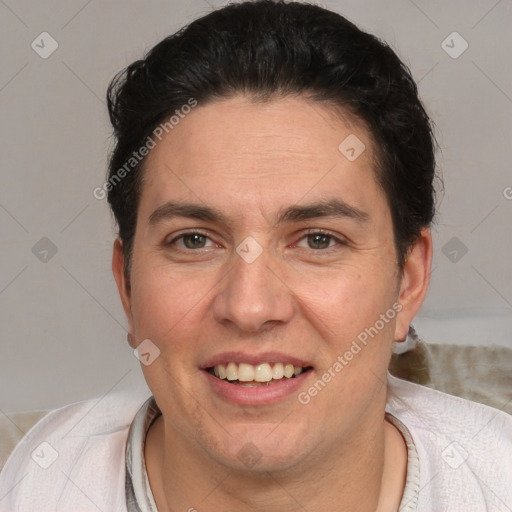 Joyful white adult female with short  brown hair and brown eyes