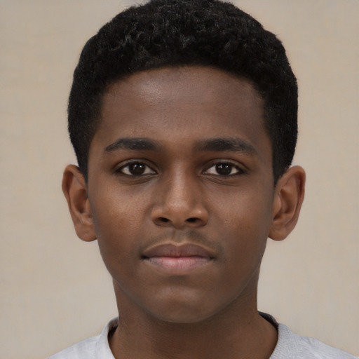 Neutral black child male with short  black hair and brown eyes