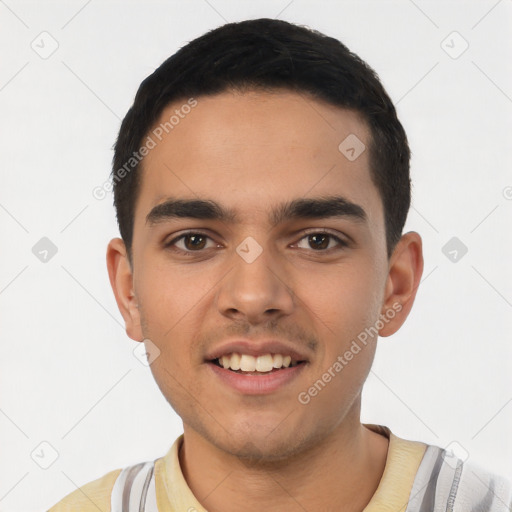 Joyful latino young-adult male with short  black hair and brown eyes