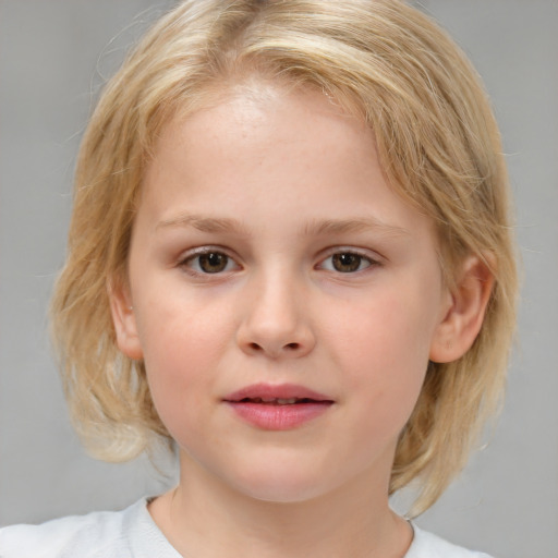 Joyful white child female with medium  brown hair and brown eyes