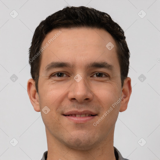 Joyful white young-adult male with short  brown hair and brown eyes