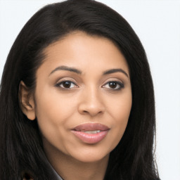 Joyful latino young-adult female with long  brown hair and brown eyes