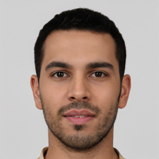 Neutral latino young-adult male with short  black hair and brown eyes