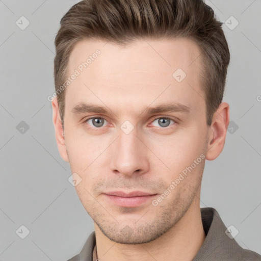 Neutral white young-adult male with short  brown hair and grey eyes