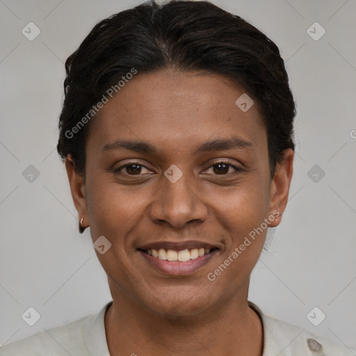 Joyful latino young-adult female with short  black hair and brown eyes