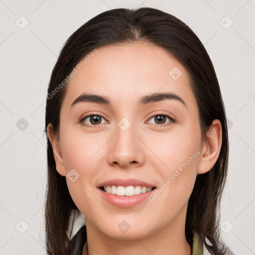 Joyful white young-adult female with long  brown hair and brown eyes