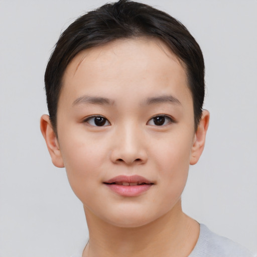 Neutral asian child female with short  brown hair and brown eyes