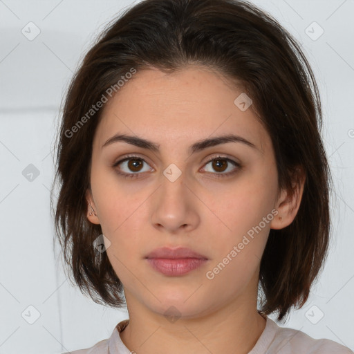 Neutral white young-adult female with medium  brown hair and brown eyes