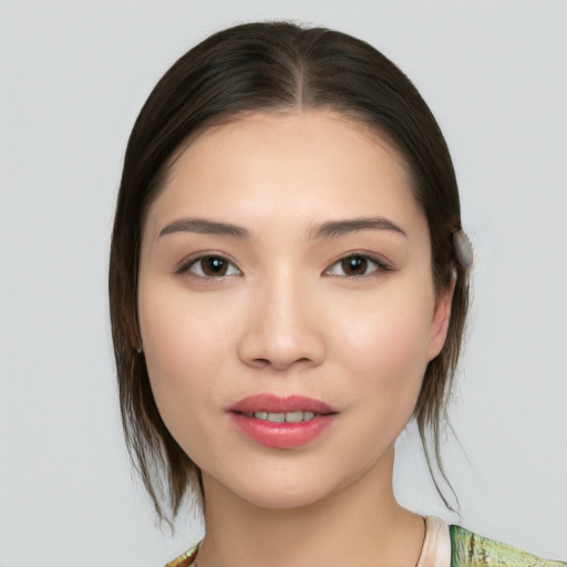 Joyful white young-adult female with medium  brown hair and brown eyes