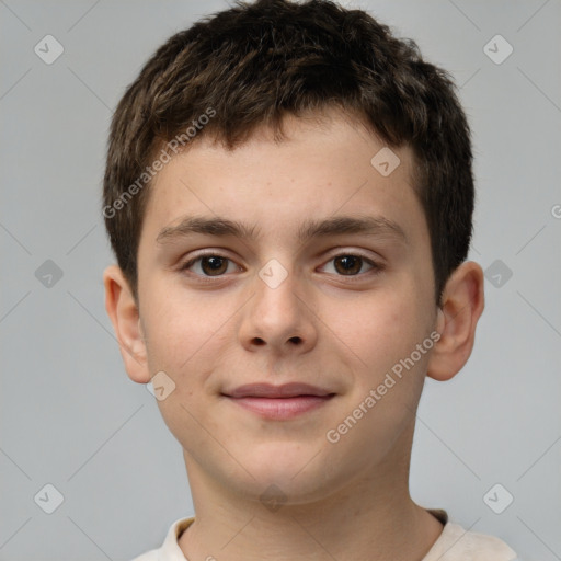 Joyful white child male with short  brown hair and brown eyes