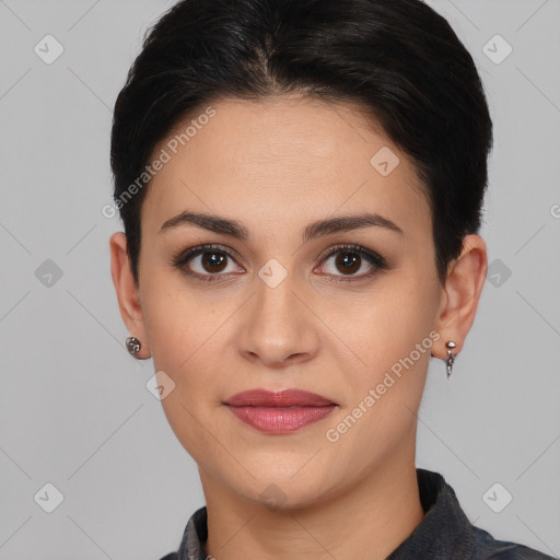 Joyful white young-adult female with short  black hair and brown eyes