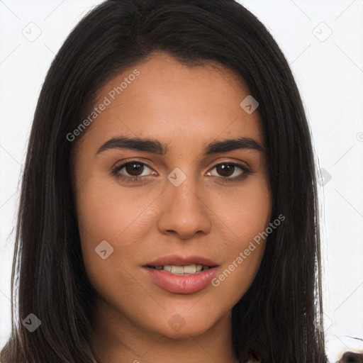 Joyful latino young-adult female with long  brown hair and brown eyes