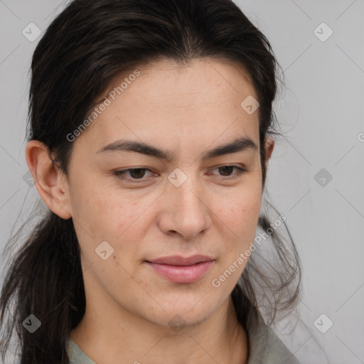 Joyful white young-adult female with medium  brown hair and brown eyes