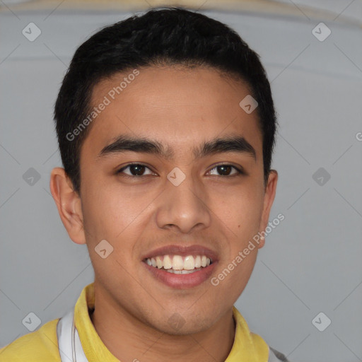 Joyful latino young-adult male with short  brown hair and brown eyes