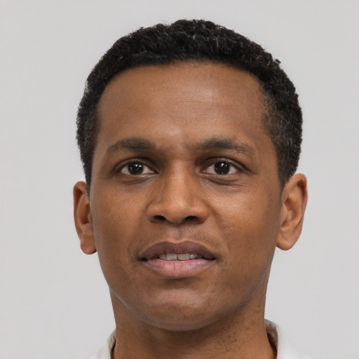 Neutral black young-adult male with short  black hair and brown eyes