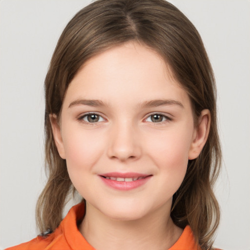 Joyful white child female with medium  brown hair and grey eyes