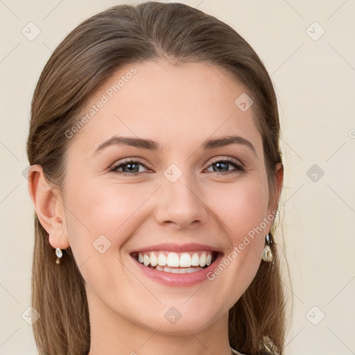 Joyful white young-adult female with long  brown hair and grey eyes