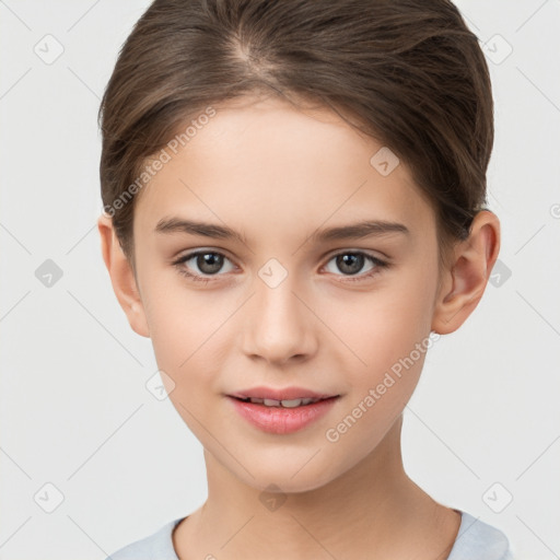 Joyful white child female with short  brown hair and brown eyes