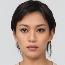 Neutral asian young-adult female with medium  black hair and brown eyes