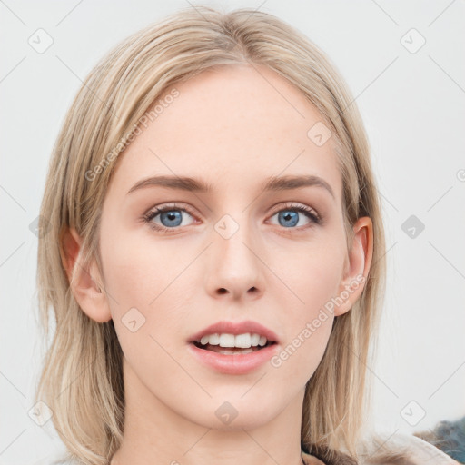 Joyful white young-adult female with medium  brown hair and blue eyes