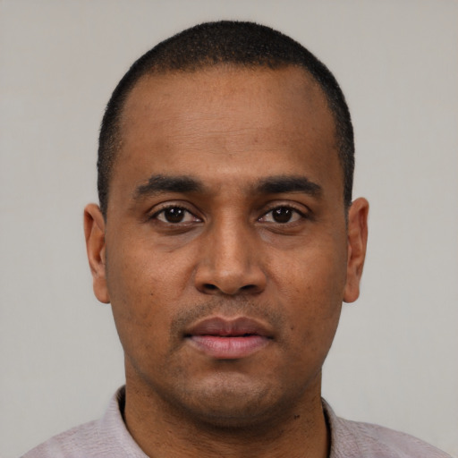 Neutral black young-adult male with short  black hair and brown eyes