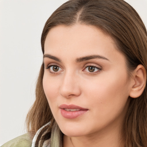 Neutral white young-adult female with long  brown hair and brown eyes