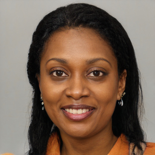 Joyful black young-adult female with medium  black hair and brown eyes