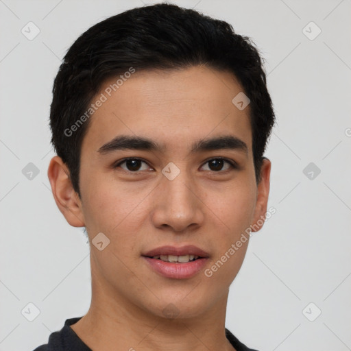 Joyful white young-adult male with short  black hair and brown eyes