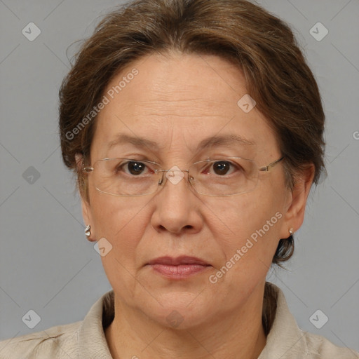 Joyful white middle-aged female with medium  brown hair and brown eyes