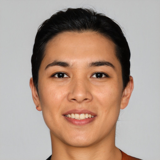 Joyful asian young-adult female with short  black hair and brown eyes