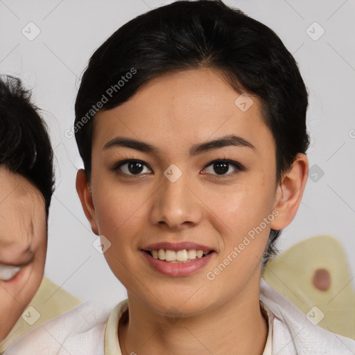 Joyful latino young-adult female with medium  brown hair and brown eyes